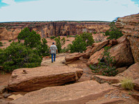 Bud walking on canyon rim 2-4