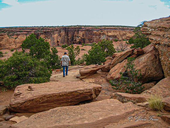 Bud walking on canyon rim 2-4